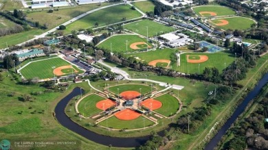 Welcome to your dream golf course home in the highly desirable on The American Golf Club in Florida - for sale on GolfHomes.com, golf home, golf lot