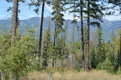 Lot 15, located in the New Rock Ridge Subdivision with Big on Whitefish Lake Golf Club in Montana - for sale on GolfHomes.com, golf home, golf lot