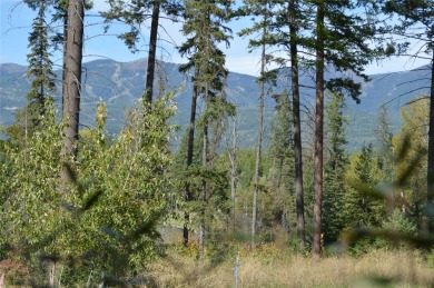 Lot 15, located in the New Rock Ridge Subdivision with Big on Whitefish Lake Golf Club in Montana - for sale on GolfHomes.com, golf home, golf lot