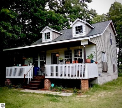 Unique, open floor plan, high ceiling home in beautiful Lake on The Pines Golf Course at Lake Isabella in Michigan - for sale on GolfHomes.com, golf home, golf lot