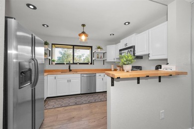 Move-In Ready Turnkey 3/2 Condo in the Heart of Oldsmar! You on East Lake Woodlands Country Club in Florida - for sale on GolfHomes.com, golf home, golf lot