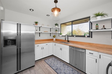 Move-In Ready Turnkey 3/2 Condo in the Heart of Oldsmar! You on East Lake Woodlands Country Club in Florida - for sale on GolfHomes.com, golf home, golf lot