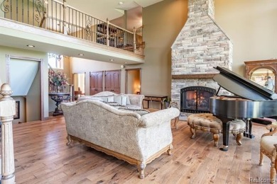 Nestled on a world-class golf course, this beautifully crafted on Prestwick Village Golf Club in Michigan - for sale on GolfHomes.com, golf home, golf lot