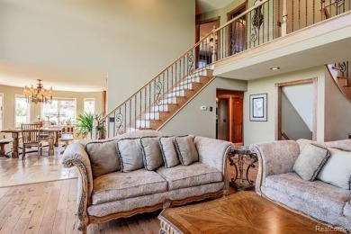 Nestled on a world-class golf course, this beautifully crafted on Prestwick Village Golf Club in Michigan - for sale on GolfHomes.com, golf home, golf lot