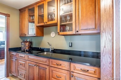 Nestled on a world-class golf course, this beautifully crafted on Prestwick Village Golf Club in Michigan - for sale on GolfHomes.com, golf home, golf lot