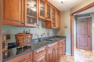 Nestled on a world-class golf course, this beautifully crafted on Prestwick Village Golf Club in Michigan - for sale on GolfHomes.com, golf home, golf lot