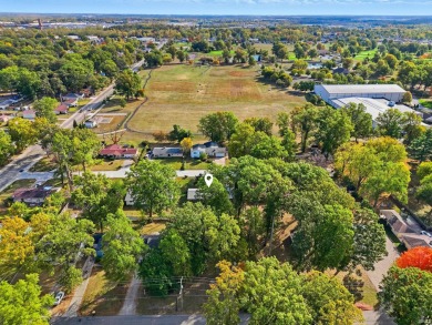 Welcome to this well-loved spacious 3-bedroom 2 full bath ranch on McMillen Park Golf Course in Indiana - for sale on GolfHomes.com, golf home, golf lot