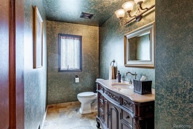 Nestled on a world-class golf course, this beautifully crafted on Prestwick Village Golf Club in Michigan - for sale on GolfHomes.com, golf home, golf lot
