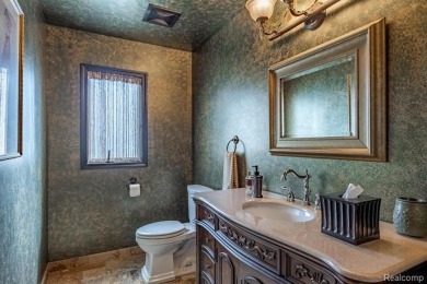 Nestled on a world-class golf course, this beautifully crafted on Prestwick Village Golf Club in Michigan - for sale on GolfHomes.com, golf home, golf lot