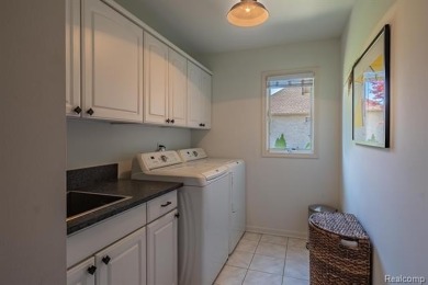 Nestled on a world-class golf course, this beautifully crafted on Prestwick Village Golf Club in Michigan - for sale on GolfHomes.com, golf home, golf lot