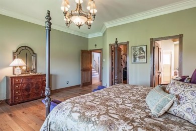 Nestled on a world-class golf course, this beautifully crafted on Prestwick Village Golf Club in Michigan - for sale on GolfHomes.com, golf home, golf lot