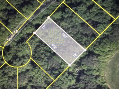 This .26 acres of undeveloped land in Woodlake Country Club is on Woodlake Country Club in North Carolina - for sale on GolfHomes.com, golf home, golf lot