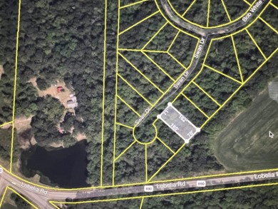 This .26 acres of undeveloped land in Woodlake Country Club is on Woodlake Country Club in North Carolina - for sale on GolfHomes.com, golf home, golf lot