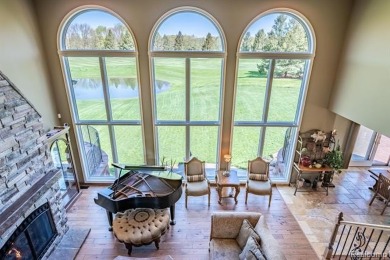 Nestled on a world-class golf course, this beautifully crafted on Prestwick Village Golf Club in Michigan - for sale on GolfHomes.com, golf home, golf lot