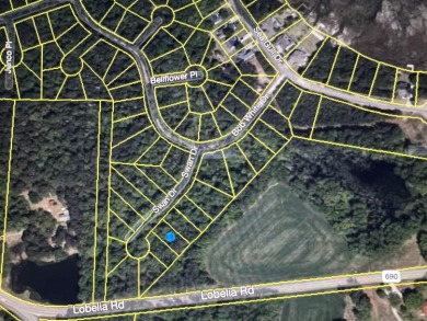 This .26 acres of undeveloped land in Woodlake Country Club is on Woodlake Country Club in North Carolina - for sale on GolfHomes.com, golf home, golf lot