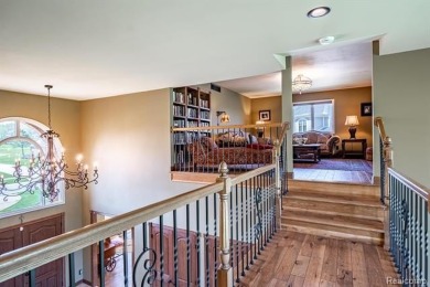 Nestled on a world-class golf course, this beautifully crafted on Prestwick Village Golf Club in Michigan - for sale on GolfHomes.com, golf home, golf lot