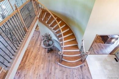 Nestled on a world-class golf course, this beautifully crafted on Prestwick Village Golf Club in Michigan - for sale on GolfHomes.com, golf home, golf lot