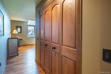 Nestled on a world-class golf course, this beautifully crafted on Prestwick Village Golf Club in Michigan - for sale on GolfHomes.com, golf home, golf lot