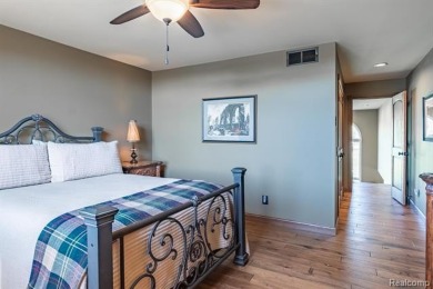 Nestled on a world-class golf course, this beautifully crafted on Prestwick Village Golf Club in Michigan - for sale on GolfHomes.com, golf home, golf lot