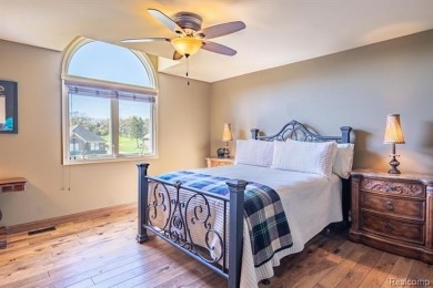 Nestled on a world-class golf course, this beautifully crafted on Prestwick Village Golf Club in Michigan - for sale on GolfHomes.com, golf home, golf lot