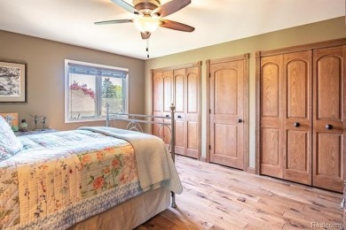 Nestled on a world-class golf course, this beautifully crafted on Prestwick Village Golf Club in Michigan - for sale on GolfHomes.com, golf home, golf lot