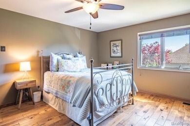 Nestled on a world-class golf course, this beautifully crafted on Prestwick Village Golf Club in Michigan - for sale on GolfHomes.com, golf home, golf lot