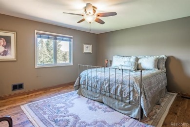 Nestled on a world-class golf course, this beautifully crafted on Prestwick Village Golf Club in Michigan - for sale on GolfHomes.com, golf home, golf lot