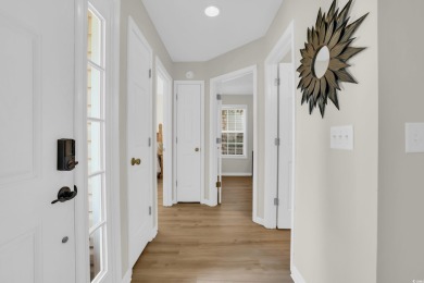 This charming 3 bed/2 bath home with a loft/bonus room is on TPC Myrtle Beach Golf Club in South Carolina - for sale on GolfHomes.com, golf home, golf lot