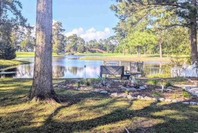 Imagine enjoying peaceful water views all day from this on River Oaks Golf Plantation  in South Carolina - for sale on GolfHomes.com, golf home, golf lot