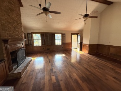 This well-maintained four-sided brick home features hardwood on Honey Creek Country Club in Georgia - for sale on GolfHomes.com, golf home, golf lot