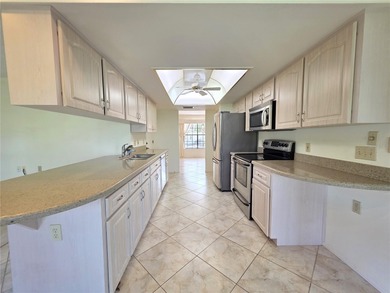 Very spacious end unit villa with beautiful golf course views on Timber Pines Golf Course in Florida - for sale on GolfHomes.com, golf home, golf lot