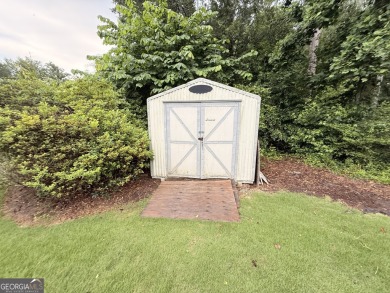 This well-maintained four-sided brick home features hardwood on Honey Creek Country Club in Georgia - for sale on GolfHomes.com, golf home, golf lot