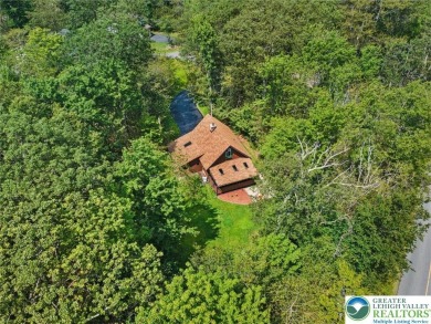 Charming Chalet in Pocono Farms Country Club. Welcome to this on Pocono Farms Country Club in Pennsylvania - for sale on GolfHomes.com, golf home, golf lot