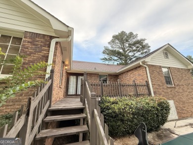 This well-maintained four-sided brick home features hardwood on Honey Creek Country Club in Georgia - for sale on GolfHomes.com, golf home, golf lot