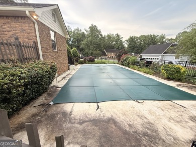 This well-maintained four-sided brick home features hardwood on Honey Creek Country Club in Georgia - for sale on GolfHomes.com, golf home, golf lot