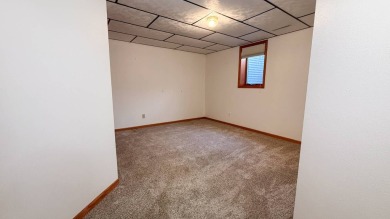 Here's an opportunity to purchase a beautiful home near Fox Run on Fox Run Municipal Golf Course in South Dakota - for sale on GolfHomes.com, golf home, golf lot