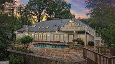 Tucked in Atlanta Country Club's quiet interior, this refreshed on Atlanta Country Club in Georgia - for sale on GolfHomes.com, golf home, golf lot