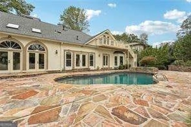 Tucked in Atlanta Country Club's quiet interior, this refreshed on Atlanta Country Club in Georgia - for sale on GolfHomes.com, golf home, golf lot