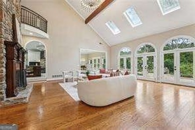 Tucked in Atlanta Country Club's quiet interior, this refreshed on Atlanta Country Club in Georgia - for sale on GolfHomes.com, golf home, golf lot