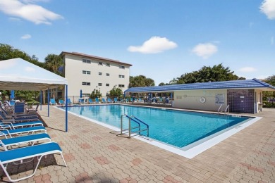 Location, Location, Location! This beautifully situated on Wynmoor Golf Course in Florida - for sale on GolfHomes.com, golf home, golf lot