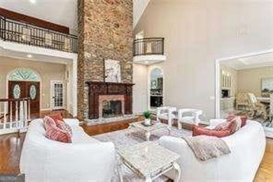 Tucked in Atlanta Country Club's quiet interior, this refreshed on Atlanta Country Club in Georgia - for sale on GolfHomes.com, golf home, golf lot