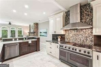 Tucked in Atlanta Country Club's quiet interior, this refreshed on Atlanta Country Club in Georgia - for sale on GolfHomes.com, golf home, golf lot