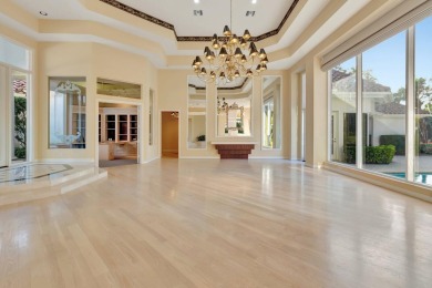 Lovely 5-bedroom + office home with southern exposure, located on St. Andrews Country Club of Boca Raton in Florida - for sale on GolfHomes.com, golf home, golf lot