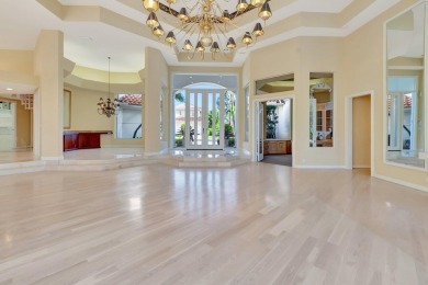 Lovely 5-bedroom + office home with southern exposure, located on St. Andrews Country Club of Boca Raton in Florida - for sale on GolfHomes.com, golf home, golf lot