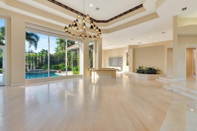 Lovely 5-bedroom + office home with southern exposure, located on St. Andrews Country Club of Boca Raton in Florida - for sale on GolfHomes.com, golf home, golf lot