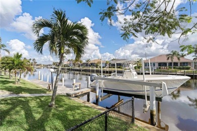 CUSTOM WATERFRONT HOME IN BSI ON KEY LOT W/**NEW METAL TILE on Twin Isles Country Club in Florida - for sale on GolfHomes.com, golf home, golf lot