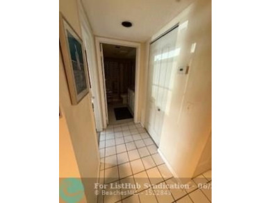 1st floor unit.  Larger one bedroom.  Vinyl flooring throughout on  in Florida - for sale on GolfHomes.com, golf home, golf lot