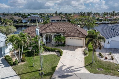 CUSTOM WATERFRONT HOME IN BSI ON KEY LOT W/**NEW METAL TILE on Twin Isles Country Club in Florida - for sale on GolfHomes.com, golf home, golf lot