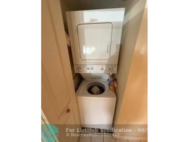 1st floor unit.  Larger one bedroom.  Vinyl flooring throughout on  in Florida - for sale on GolfHomes.com, golf home, golf lot