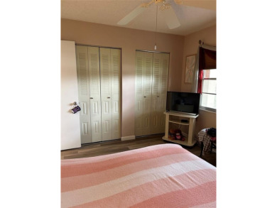 1st floor unit.  Larger one bedroom.  Luxury Vinyl plank on Flamingo Lakes Country Club in Florida - for sale on GolfHomes.com, golf home, golf lot